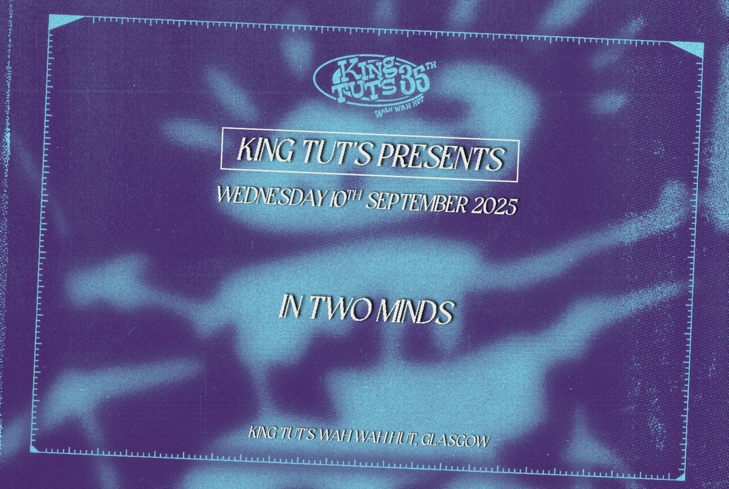 King Tut’s Presents: In Two Minds in white writing on blue background